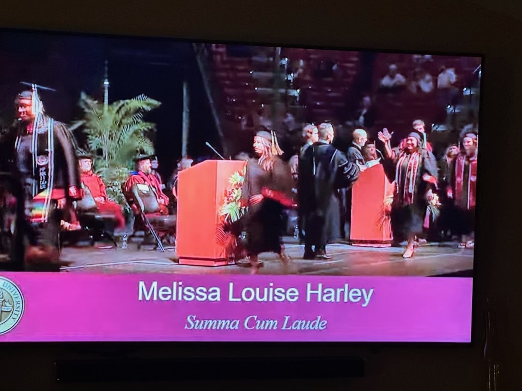 Melissa walking the stage at her Florida State graduation